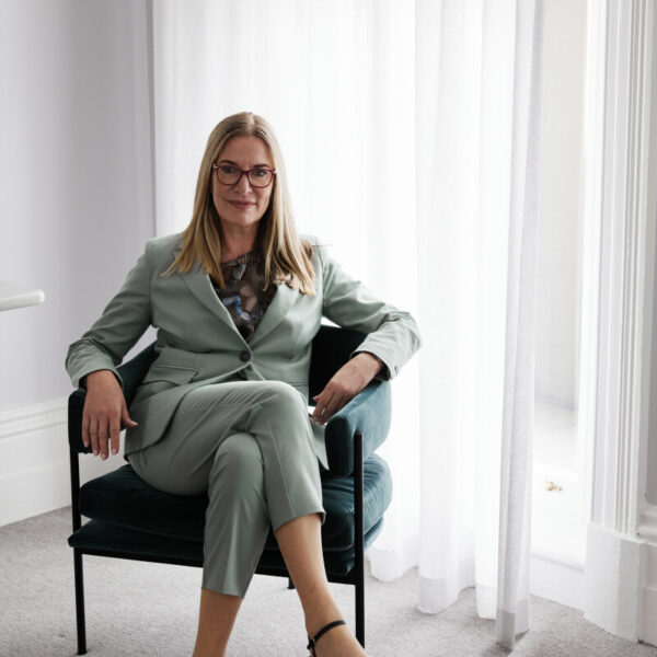 Doctor Rachael Knight is sitting on an arm chair