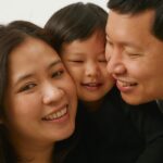 a young family of three with father, mother and child