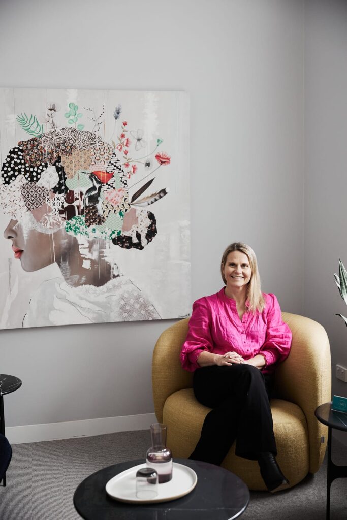 Suellen Peak Dr Rachael's Senior Fertility Counsellor sitting down on a chair