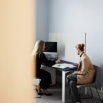 Clinic staff member speaking to a client